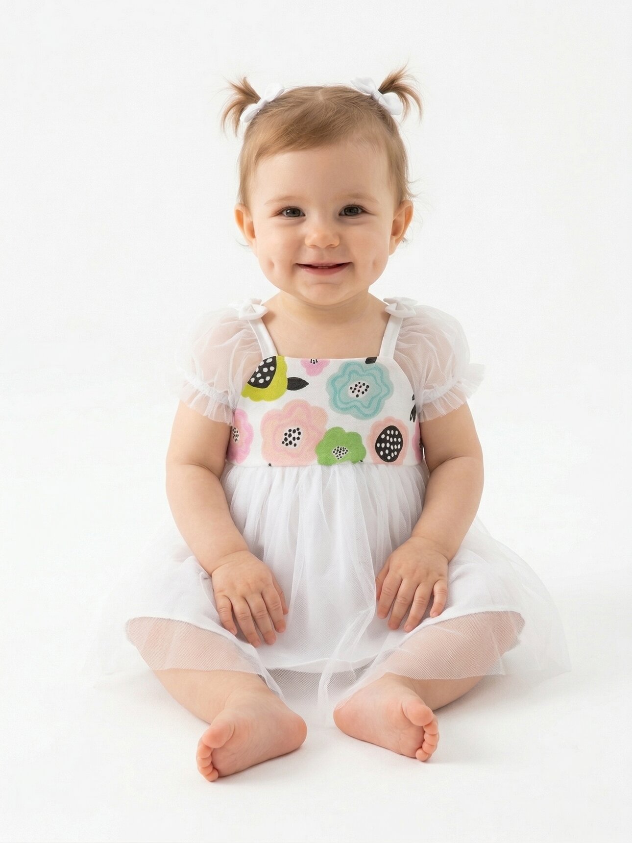 Organik Pamuklu Arkası Fiyonk Detaylı Çiçek Desenli Kız Bebek Elbise