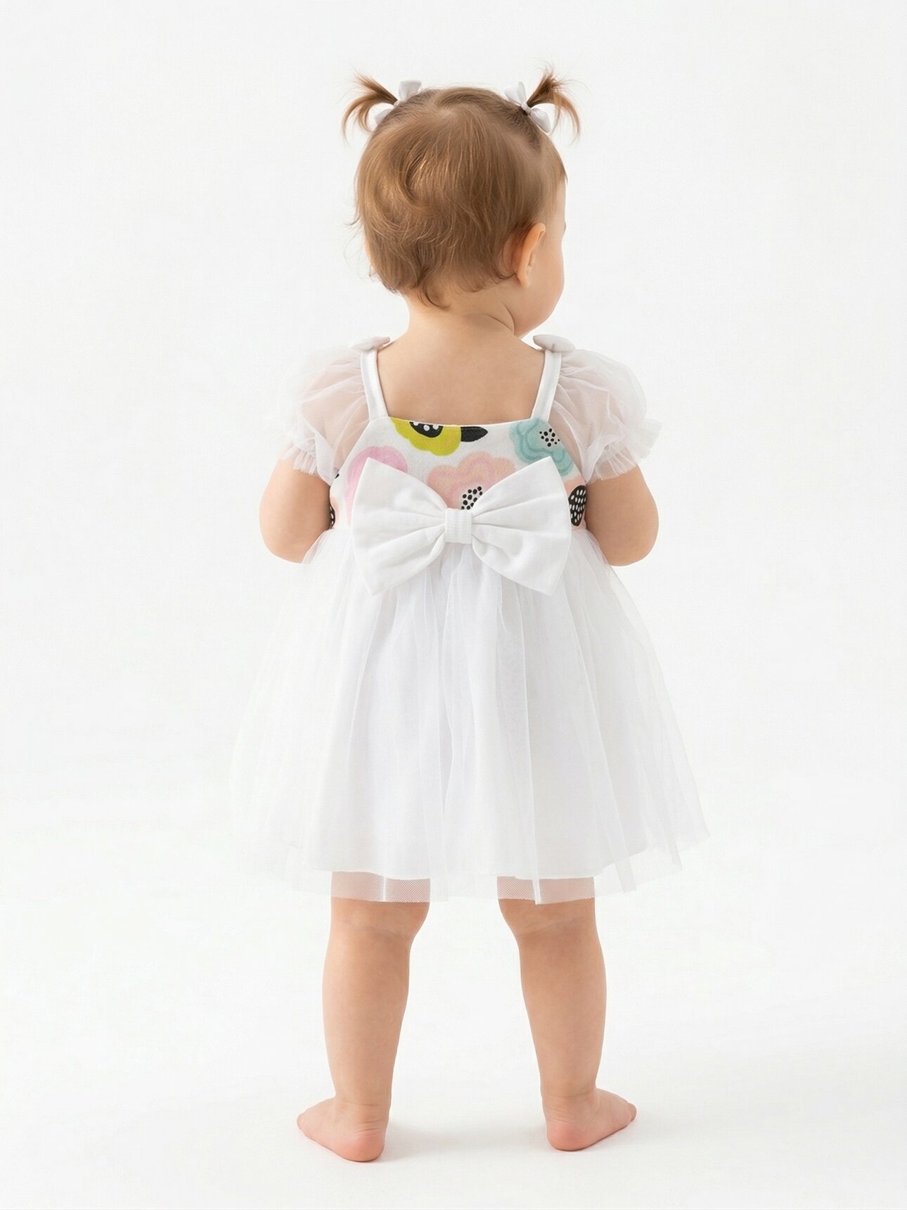 Organik Pamuklu Arkası Fiyonk Detaylı Çiçek Desenli Kız Bebek Elbise